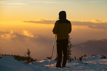 Canvas Print - Hiker in a wintry mountain landscape