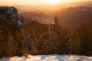 Wall Mural - Beautiful sunrise at winter in Ceahlau Mountains, Romania