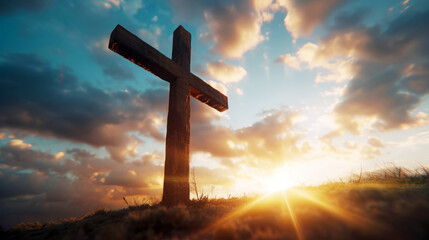 Wall Mural - Rustic Wooden Cross at Sunset, Sunset rays illuminating a rustic wooden cross against a clouded sky.