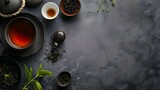 Fototapeta  - minimalistic design Aromatic pu-erh tea served on grey table, top view. Banner design with space for text