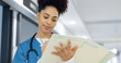 © Felix/peopleimages.com - Writing, nurse and document in hospital for insurance, healthcare and compliance report with patient information. Paperwork, checklist and doctor with medical notes in file, chart or folder in clinic