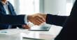 © HockleyMedia/peopleimages.com - Business people, closeup and handshake for deal, agreement and partnership negotiation in office. Shaking hands, contract and hiring offer for recruitment, interview and financial analyst in meeting