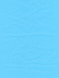 Fototapeta  - Surface of colored paper, sheet of crumpled light blue paper