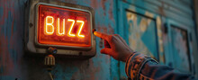 Buzz concept image with person hand touching a big buzzer button with written Buzz word
