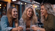 © redflower - Group of beautiful happy women meeting outdoors and having fun drinking in a cafe shop