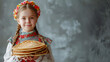 Shrovetide banner with copy space, girl with a plate of pancakes on a gray background with space for text