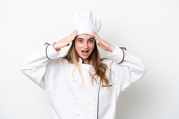 Wall Mural - Young caucasian chef woman isolated on white background with surprise expression