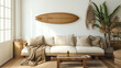living room with surfboard on a wall, houseplants and sofas