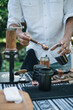 barista make coffee from aram coffee machine