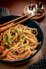 Poster - Fried noodles with chicken and vegetables.