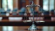 Scales of justice on a blurred courtroom background, a powerful symbol for legal services, law firms, and the justice system.