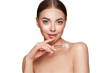 Wall Mural - portrait beautiful young woman with clean fresh skin. model with cosmetic makeup brush. cosmetology,