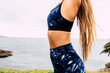 © simona - Beautiful adult woman do balanced fitness healthy activity outdoor with ocean view - people and active lifestyle concept with sport and health life - enjying body and fit life