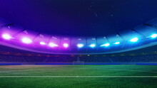 Football Field, Empty Soccer Stadium With Green Grass Illuminated With Colorful Spotlight At Night With Starry Clear Sky. Concept Of Sport, Championship Tournaments 2024, League, Match, Win. Ad