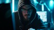 © TensorSpark - A shadowy figure of a hacker with a hoodie sits in a dark room, typing malicious code on a computer with multiple screens, committing cybercrime.