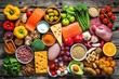 © Straxer - High angle view of various kinds of food types isolated on a rustic wooden background.