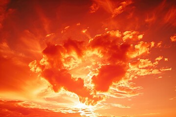 Wall Mural - Romantic sunset with heartshaped clouds.