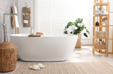 Poster - Set of different bath accessories and soap on tub in bathroom