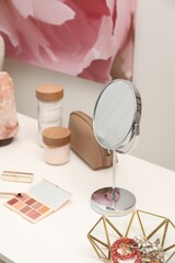 Poster - Dressing table with mirror, cosmetic products and jewelry in makeup room