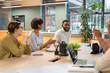 © Cultura Creative - Business people having meeting in office
