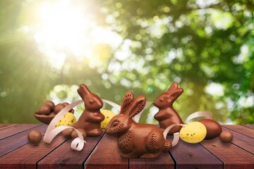 Wall Mural - Painted colored Easter eggs and bunny on the desk