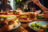 Fototapeta  - People enjoying a delicious meal, club sandwiches with ham and cheese while dining out