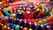 An overhead photo of many different beads, shot from the top on a white background with copy space