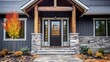© haizah - A grey modern farmhouse front door with a covered porch, wood front door with glass window, and grey vinyl and wood siding.
