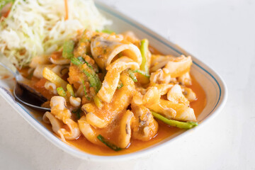 Wall Mural - Stir fried squid with salted egg york. Delicious Thai dish.