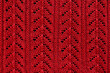 red background knitted openwork material with close-up pattern