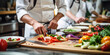 © SHOTPRIME STUDIO - Professional Chef Preparing Fresh Organic Vegetable Salad in a Kitchen