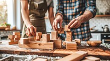 Amidst The Cozy Indoor Atmosphere, A Group Of Artisan-clad Individuals Gather To Play With Wooden Blocks, Each One Carefully Cutting And Arranging The Pieces To Create A Delectable Feast For The Eyes