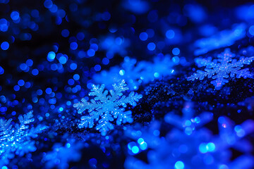 Wall Mural - snowflakes on black background with blue light in the