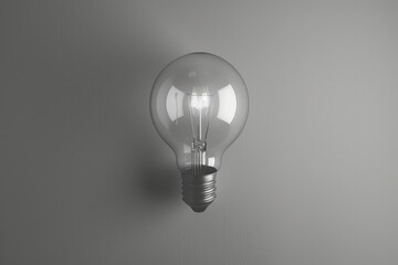 Poster - A light bulb hanging on a wall in a room. Suitable for interior design projects