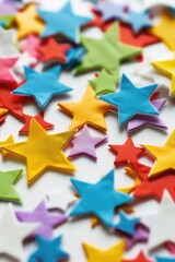 Poster - A table adorned with a variety of vibrant colored stars. Perfect for adding a touch of brightness and whimsy to any space
