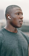 Canvas Print - Fitness, city and tired black man thinking of running journey, workout and listening to music or podcast. Young athlete, runner or sports person breathing, exercise break and ready for urban training