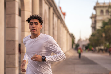 Portrait of a handsome young man running. A healthy lifestyle.