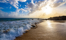 Sunset Panorama At “Grand Anse Des Salines“ Famous Sandy Beach On French Tropical Island Martinique In The Caribbean Sea. Colorful Idyllic Seascape With Waves, Rocks, Cloudy Sky And Warm Sunlight.