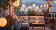 Cozy outdoor roof terrace with a sofa and coffee table is decorated with garlands and lamps at blue hour.