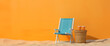 background with beach chair orange wall copy space sand on the ground blue deckchair wicker table with glasses fruit juice drinks vacation holidays sunlight relaxation rest pleasure vivid bold colors