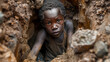 © mikhailberkut - A child working illegally in a mine in difficult conditions. Illegal forced child labor. The concept of illegal human trafficking