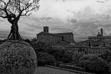 Wall Mural - Siena Italy 09 30 2022: Old Medieval city in Tuscany in Europe. Art and culture. Tourists from all over the world for Piazza del Campo Palio Duomo Tower del Mangia and the oldest bank banco dei Paschi