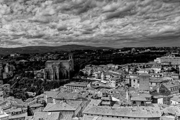 Wall Mural - Siena Italy 09 30 2022: Old Medieval city in Tuscany in Europe. Art and culture. Tourists from all over the world for Piazza del Campo Palio Duomo Tower del Mangia and the oldest bank banco dei Paschi