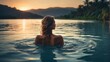 Woman enjoys serene swim in lagoon at dusk, nature's swimming pool