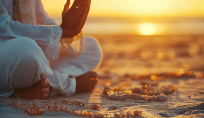 Wall Mural - Muslim man praying at sunset on ocean background	