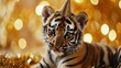 Tiger cub with birthday hat, golden background, generative ai