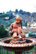 Italian Rose Garden Fountain
Girl statue figure Statue figure of a young girl. Fountain Decoration on the street in Florence, Italy