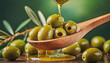 close-up green olives and olive oil on them