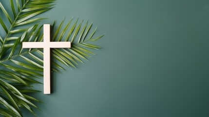 Wall Mural - Christian cross and palm leaf on a neutral background with copy space
