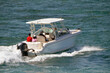 Motorboat with covered center console cruising on the FloridaIntra-Coasstal Waterway off of Miami Beach.